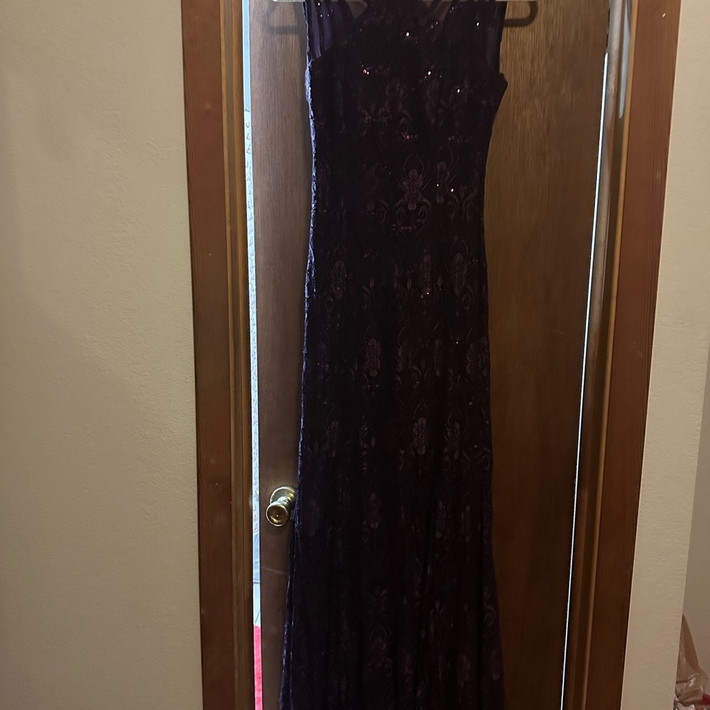 Women’s Size 4P, Plum colored formal gown, excellent condition.
